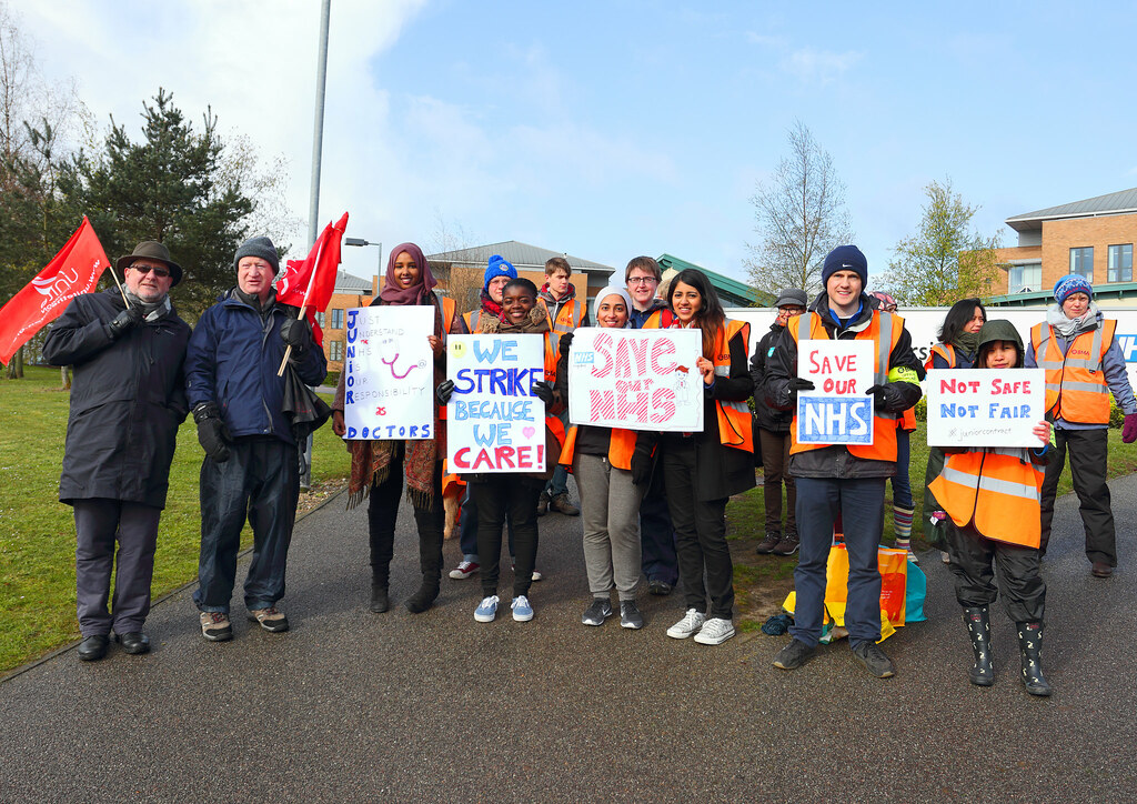 Healthcare staff outside a hospital, representing routine health checkups